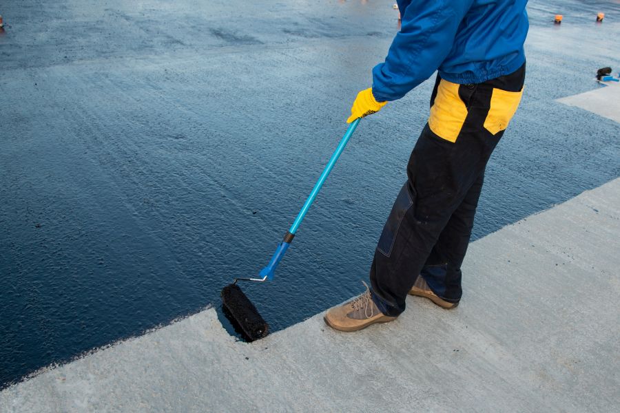 Why Fluid-Applied Roof Coatings Are The Slick, Shiny Secret to a Longer-Lasting Roof