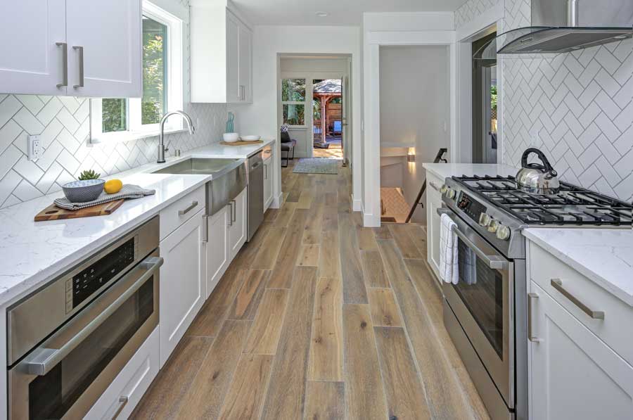 Hardwood vs Faux Wood Tile