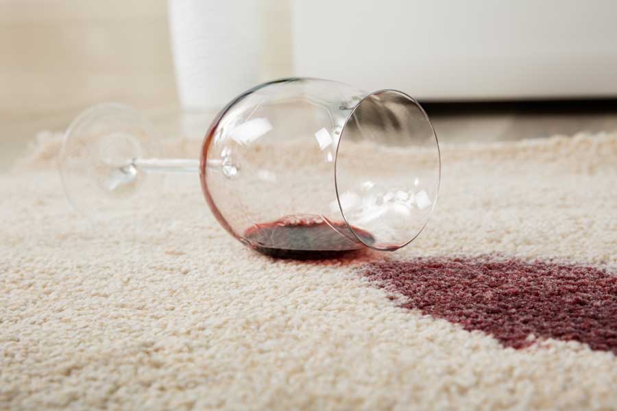 How to Handle Wine Stains on Carpet